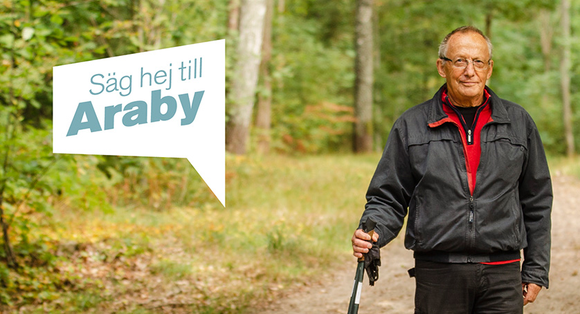 Foto på Bengt som står på en skogsväg med stavar i handen. Text 